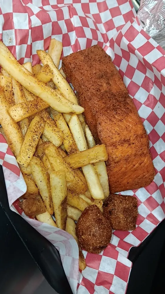Single Fried Salmon with a Side of Seasoned Fries